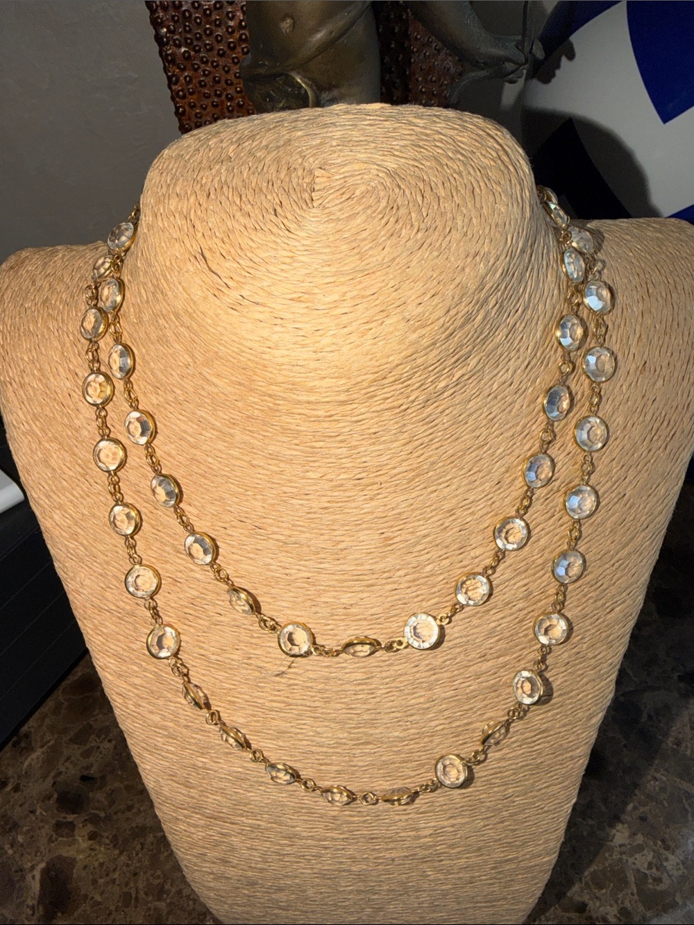 Long crystal gold tone necklace can be worn different ways